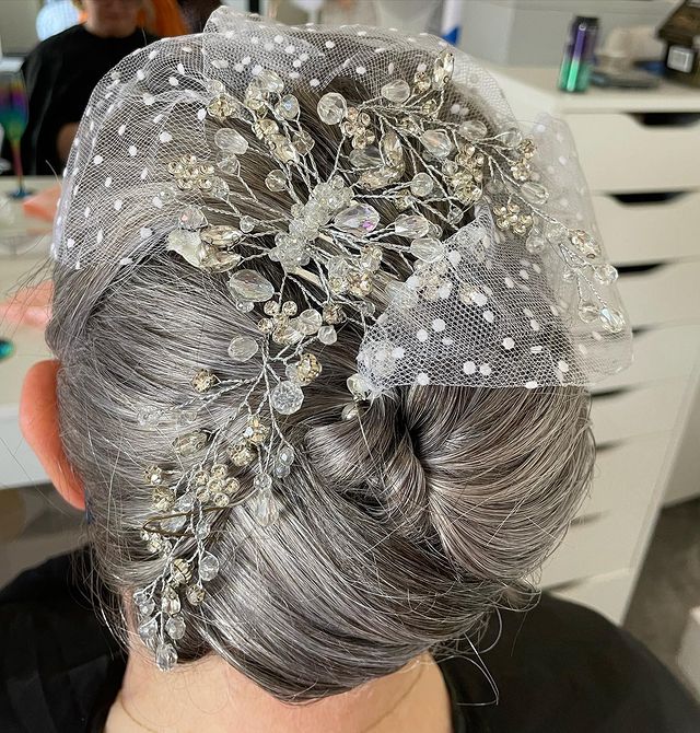 12.Voluminous vintage-inspired wedding updo